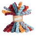 Colorful skeins of yarn tied together with a label on a white background