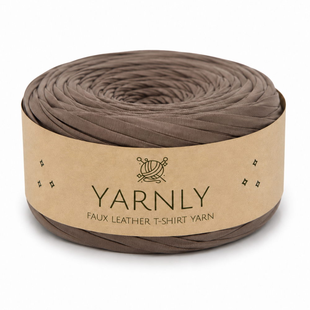 A roll of Yarnly faux leather T-shirt yarn in a taupe-brown color, wrapped in a kraft paper band with the brand name 'YARNLY' printed on it, set against a plain white background.