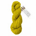 A skein of mustard yellow woolstok yarn next to a matching ball of yarn on a white background, with text reading 'woolstok worsted by blue sky fibers' and a tag that says 'BLUE SKY FIBERS'.